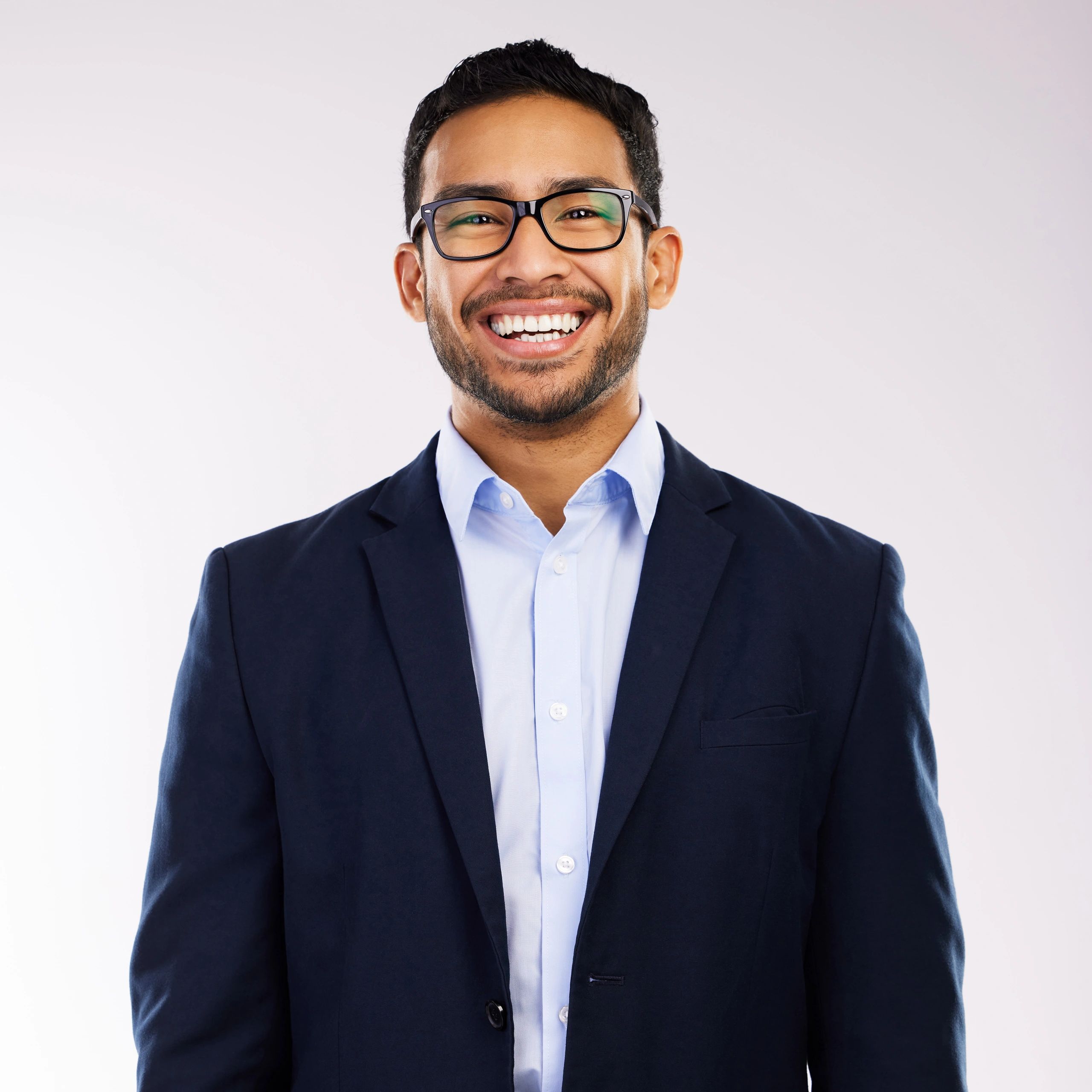 Professional headshot of a man smiling