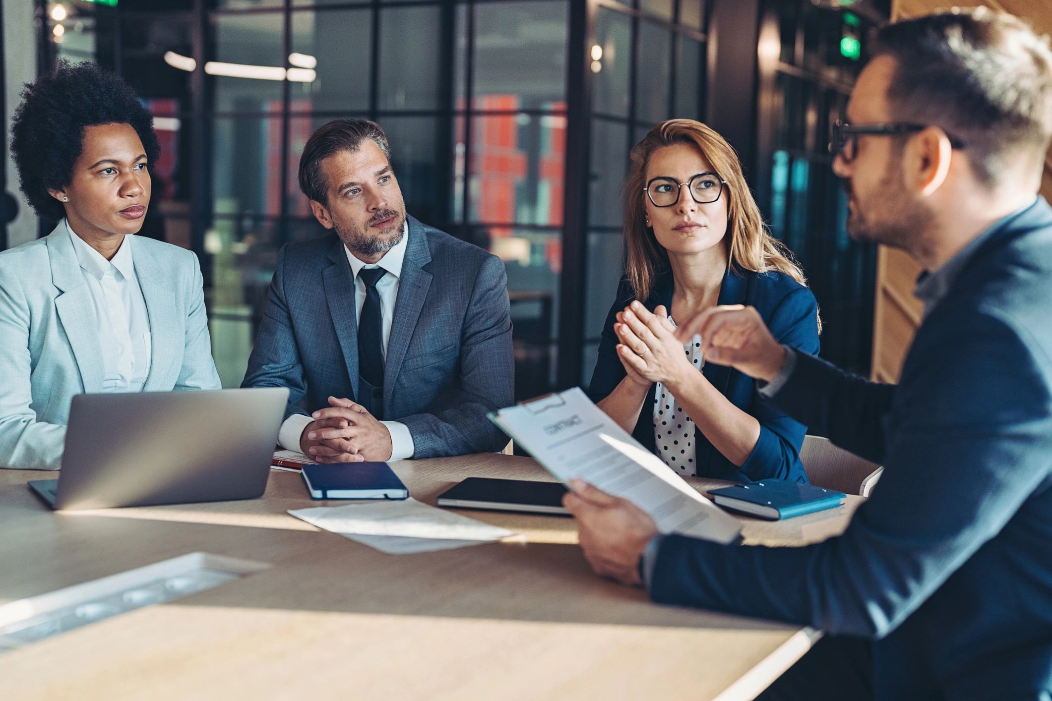 Team members collaborating in a meeting